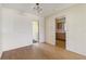 The living room has wood laminate flooring and access to other rooms at 417 Glen Oak Rd, Venice, FL 34293