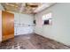 This room features a ceiling fan and a window air conditioning unit at 417 Glen Oak Rd, Venice, FL 34293