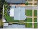Aerial view of the home with a fenced backyard and a detached garage at 480 28Th N Ave, St Petersburg, FL 33704