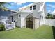 Backyard features a gray wood deck and attractive storage shed at 480 28Th N Ave, St Petersburg, FL 33704