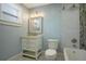 This stylish bathroom includes a vanity with modern fixtures and a subway tiled shower at 480 28Th N Ave, St Petersburg, FL 33704