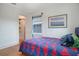 Comfortable bedroom with hardwood floors and a view of the closet at 480 28Th N Ave, St Petersburg, FL 33704