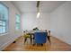 Dining room featuring a wooden table, stylish chairs, and neutral tones at 480 28Th N Ave, St Petersburg, FL 33704