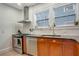 Kitchen features stainless steel appliances, granite countertops, and cherry cabinets at 480 28Th N Ave, St Petersburg, FL 33704