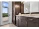 Beautiful bathroom with granite counters, wood cabinets and exterior views at 4931 Benito Ct, Bradenton, FL 34211