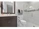 Elegant bathroom with a glass-enclosed shower, modern vanity, and sleek fixtures at 4931 Benito Ct, Bradenton, FL 34211