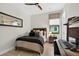 Cozy bedroom with neutral tones, featuring a comfortable bed, window, and stylish decor at 4931 Benito Ct, Bradenton, FL 34211