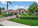 Beautiful exterior elevation of a modern two-story home with lush landscaping at 4931 Benito Ct, Bradenton, FL 34211