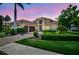 Stunning two-story home with well-manicured landscaping and a paved driveway at 4931 Benito Ct, Bradenton, FL 34211