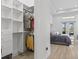 Conveniently located, this walk-in closet provides ample space and is adjacent to the primary bedroom at 4931 Benito Ct, Bradenton, FL 34211