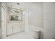 Modern bathroom with marble countertops, vanity lighting, and sleek fixtures at 5018 Hanging Moss Ln, Sarasota, FL 34238