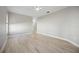 Bright bedroom with hardwood flooring, a ceiling fan and neutral paint at 5018 Hanging Moss Ln, Sarasota, FL 34238