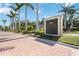 Turtle Rock on Palmer Ranch entrance sign framed by palm trees and mature landscaping at 5018 Hanging Moss Ln, Sarasota, FL 34238