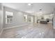 Bright, open floor plan with natural light, hardwood floors and direct access to the kitchen at 5018 Hanging Moss Ln, Sarasota, FL 34238