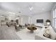 Open-concept layout featuring living room, kitchen, and dining areas at 5018 Hanging Moss Ln, Sarasota, FL 34238