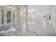 Bright and spacious living room with hardwood floors and natural light at 5018 Hanging Moss Ln, Sarasota, FL 34238