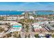 Expansive aerial view showcases the city with picturesque waterways and clear blue skies at 510 Wedge Ln, Longboat Key, FL 34228