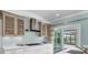 Well-appointed kitchen with stainless appliances and gas cooktop at 510 Wedge Ln, Longboat Key, FL 34228
