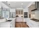 Gourmet kitchen with stainless steel appliances and custom cabinetry at 510 Wedge Ln, Longboat Key, FL 34228