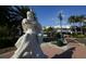 Statue near Columbia Restaurant with charming street and sunny blue sky in the background at 510 Wedge Ln, Longboat Key, FL 34228
