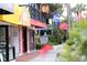 Charming street view of a sidewalk, with local businesses and lush landscaping at 510 Wedge Ln, Longboat Key, FL 34228