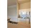 Efficient kitchen with white cabinets, appliances, laminate counters, and a stainless steel sink for easy meal preparation at 5146 Northridge Rd # 310, Sarasota, FL 34238