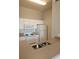 Well-maintained kitchen with white cabinetry, essential appliances, and a practical double sink setup at 5146 Northridge Rd # 310, Sarasota, FL 34238