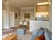 Inviting living area featuring a dining table, comfortable seating and an open layout with a kitchen view at 5146 Northridge Rd # 310, Sarasota, FL 34238