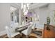 Dining room offering ample space, contemporary lighting, and an open layout with access to other living areas at 5328 Brookgrove Dr, Sarasota, FL 34238