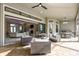 Expansive outdoor living area with seamless transition to the interior, perfect for entertaining at 5328 Brookgrove Dr, Sarasota, FL 34238