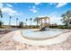 Fun splash pad with a slide, play structures, and soft surfacing, perfect for entertainment at 5328 Brookgrove Dr, Sarasota, FL 34238