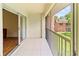 Screened patio providing additional space, with scenic outdoor view at 5500 Longwood Run Blvd # 203, Sarasota, FL 34243