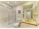 Bathroom featuring a shower, toilet, vanity and mirror at 5728 Ashton Lake Dr # 12, Sarasota, FL 34231
