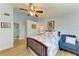 Relaxing bedroom features cool paint and comfortable furniture at 5728 Ashton Lake Dr # 12, Sarasota, FL 34231