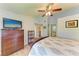 Comfortable bedroom shows an ensuite bathroom and ample storage at 5728 Ashton Lake Dr # 12, Sarasota, FL 34231