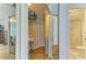 Mirrored closet doors lead to a storage area and bathroom at 5728 Ashton Lake Dr # 12, Sarasota, FL 34231