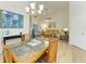 Open-concept dining and living area featuring stylish decor and lots of natural light at 5728 Ashton Lake Dr # 12, Sarasota, FL 34231
