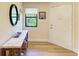 Bright entryway with stylish decor, a console table, and a welcoming front door at 5728 Ashton Lake Dr # 12, Sarasota, FL 34231