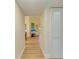 Hallway view featuring a dining room and a living room at 5728 Ashton Lake Dr # 12, Sarasota, FL 34231