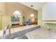 Open floorplan featuring a breakfast bar which overlooks the dining and living rooms at 5728 Ashton Lake Dr # 12, Sarasota, FL 34231