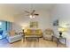 Cozy living room features neutral decor, comfortable seating, and lots of natural light at 5728 Ashton Lake Dr # 12, Sarasota, FL 34231