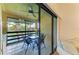 Patio with a lake view, a ceiling fan, and a table with four chairs at 5728 Ashton Lake Dr # 12, Sarasota, FL 34231