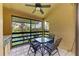 Outdoor patio providing serene views of a lake framed by lush greenery at 5728 Ashton Lake Dr # 12, Sarasota, FL 34231