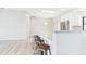 Modern kitchen with counter seating and stainless steel appliances at 6107 Misty Oaks St, Sarasota, FL 34243
