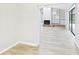 Open living room features a fireplace and built-in shelving, seamlessly connecting to outdoor spaces at 6107 Misty Oaks St, Sarasota, FL 34243