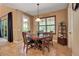 Cozy dining room featuring a round table and natural lighting at 6302 Anise Dr, Sarasota, FL 34238