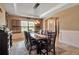 Welcoming dining area with a large window and a sophisticated decor for comfortable Gathering meals at 6302 Anise Dr, Sarasota, FL 34238