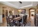 Spacious dining room with seating for ten, classic design, and easy access to other living spaces at 6302 Anise Dr, Sarasota, FL 34238