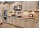 Well-equipped kitchen with stainless steel appliances, granite countertops, and ample cabinet space for storage at 6302 Anise Dr, Sarasota, FL 34238