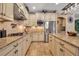 Well-equipped kitchen with ample counter space and stainless steel appliances at 6302 Anise Dr, Sarasota, FL 34238